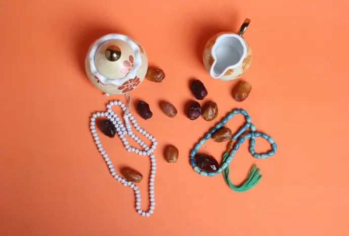 a table topped with beads and other items